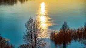 Zachód słońca nad grodziskiem Święta Góra i jeziorem Wojnowo, luty 2022 r. - zdjęcie 2