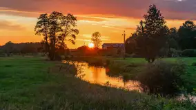 Zachód słońca nad rzeką Gołdapa w Baniach Mazurskich, lipiec 2025 r. - zdjęcie 16